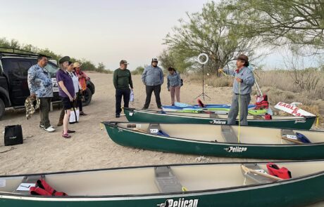 Outfitter’s River Briefing: The outfitter prepares the class for their river expedition, setting expectations for the journey.
