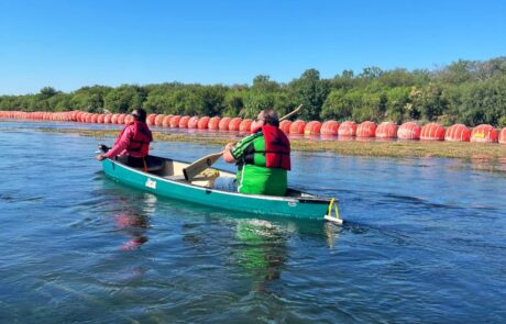 Navigating the Rio Grande: Canoeing past the iconic border buoys, the group tackles the challenging waters of the Rio Grande.