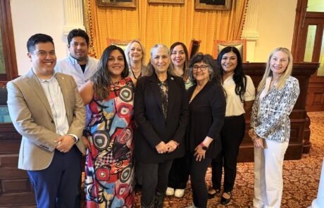 Texas State Representative Lulu Flores poses with members of the Leadership Tejas after her presentation.